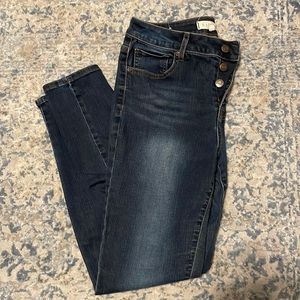 Harper, medium wash skinny jeans.